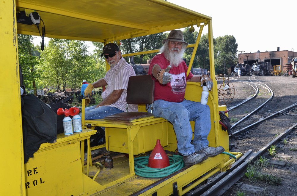 2018-08-02 Looks like Brad and a helper are getting a speeder ride.jpg