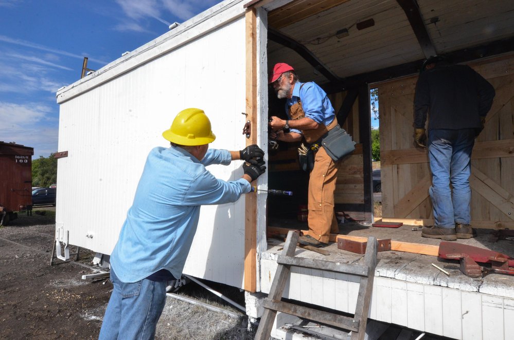 2018-08-03 Getting the stop mounted on the sliding side door.jpg