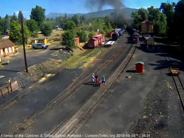 2018-08-04 The parlor is passing the tank as the locomotives are clearing the yard.jpg