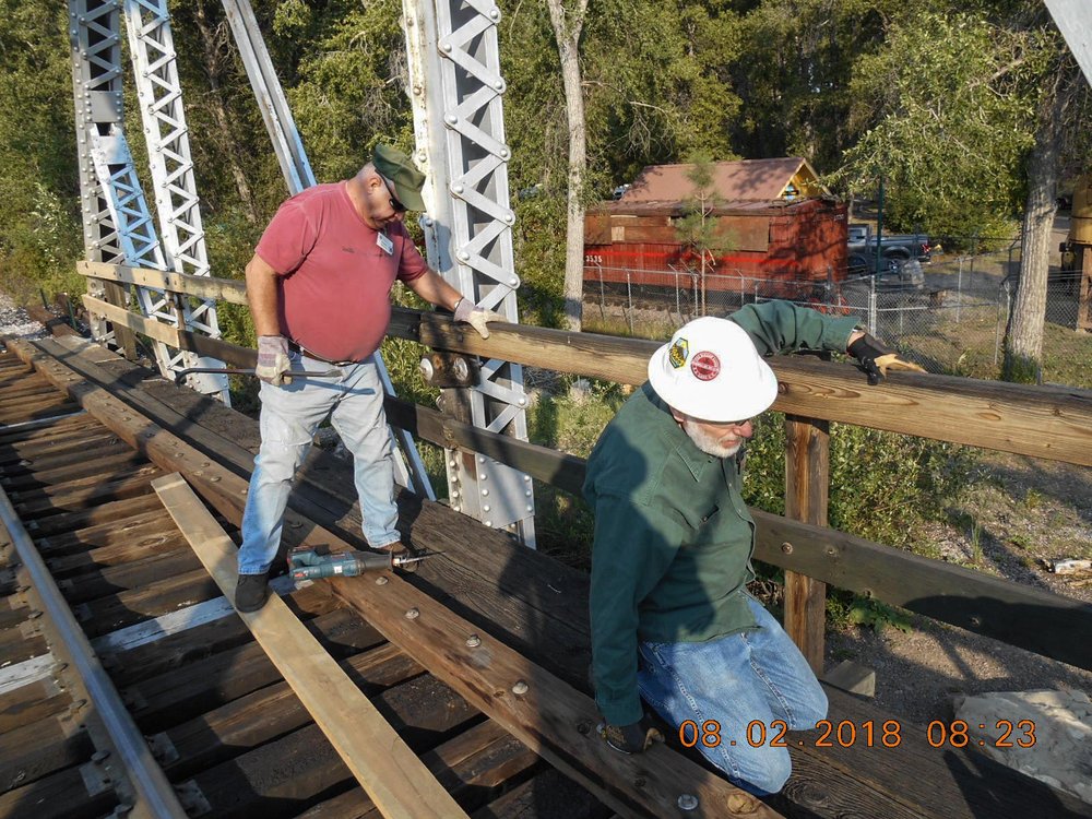 2018-08-01 Two crew members are getting ready to replace a board.jpg