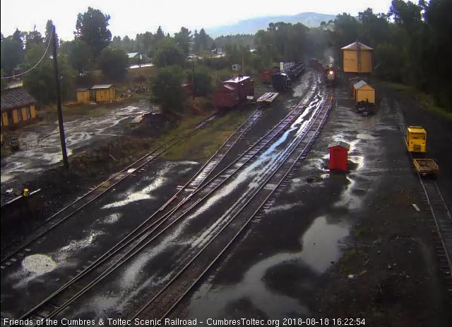2018-08-18 The 489 comes up to the tank as the parlor passes the house lead switch.jpg