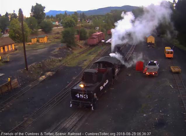 2018-08-25 The 483 backs down to the coal dock lead as Avery gets gas cans for filling.jpg