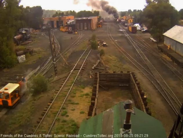 2018-08-25 The 487 has coupled onto today's 7 car train 216 as the speeder fills its water tank.jpg