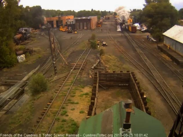 2018-08-25 With cool, damp air again we have nice steam effects as 487 gets the train moving.jpg