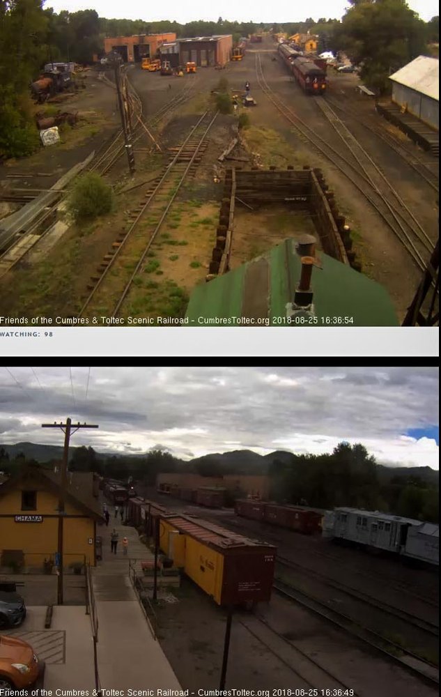 2018-08-25 The 463 is by the display train as the parlor crosses the access road.jpg