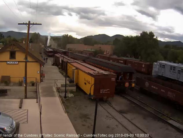 2018-09 After giving the high ball, the conductor has climbed onto the parlor and the engineer is blowing for departure.jpg