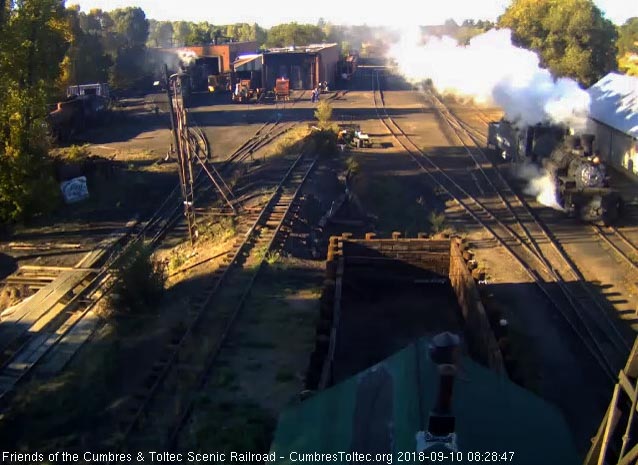 2018-09-10 The early morning sun shines on the 489 as it moves by the woodshop.jpg