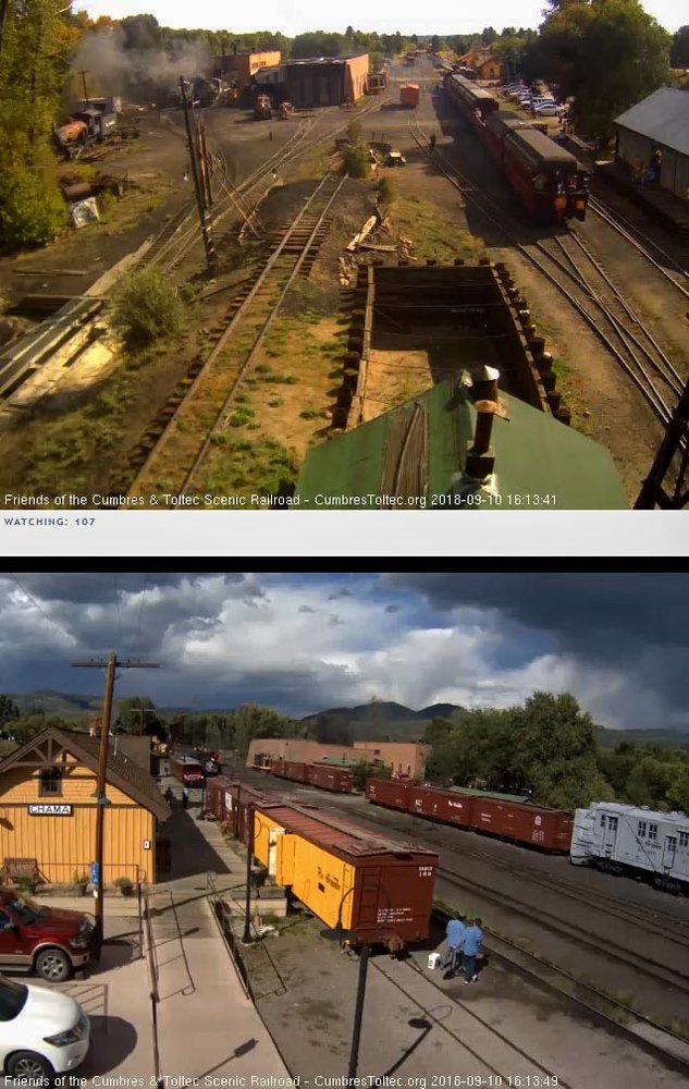 2018-09-10 The 484 is passing the display cars will the parlor is by an open woodshop.jpg