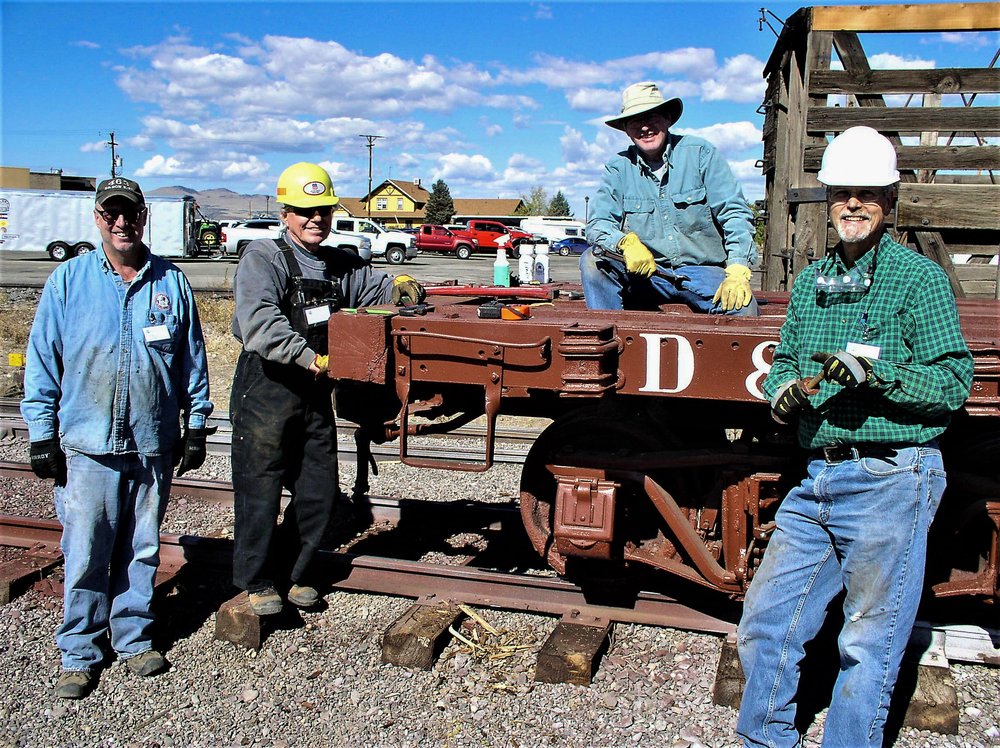 2018-09-24 The crew members pose with one of their finished jobs, looks like a flat car.jpg