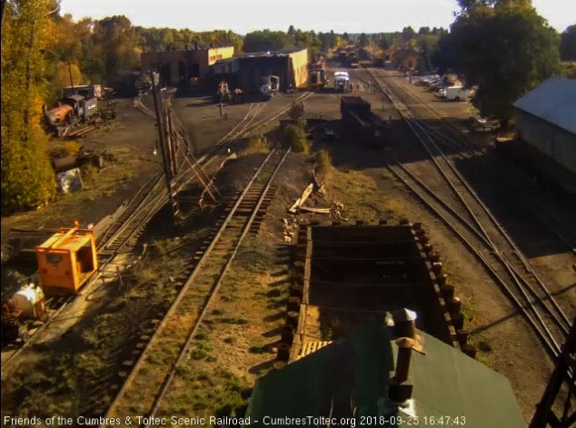 2018-09-25 With the passenger consist headed to the wye, 15 comes out from beside the roundhouse.jpg