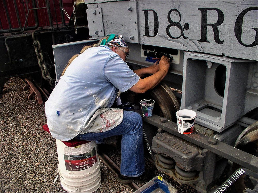 2018-09-25 Stenciling goes on a piece, based on colour, of MoW equipment.jpg