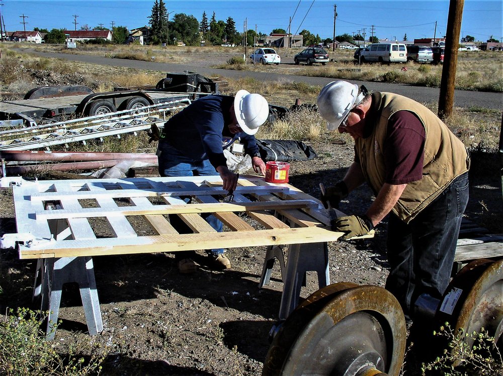 2018-09-25 With the new door now fabricated, the crew gets to priming it.jpg