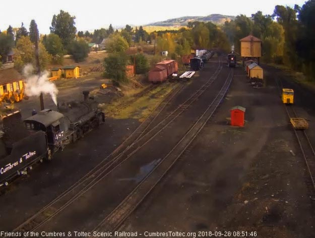 2018-09-26 The 487 is getting coal added to its bunker as 489 washes the newly added coal.jpg