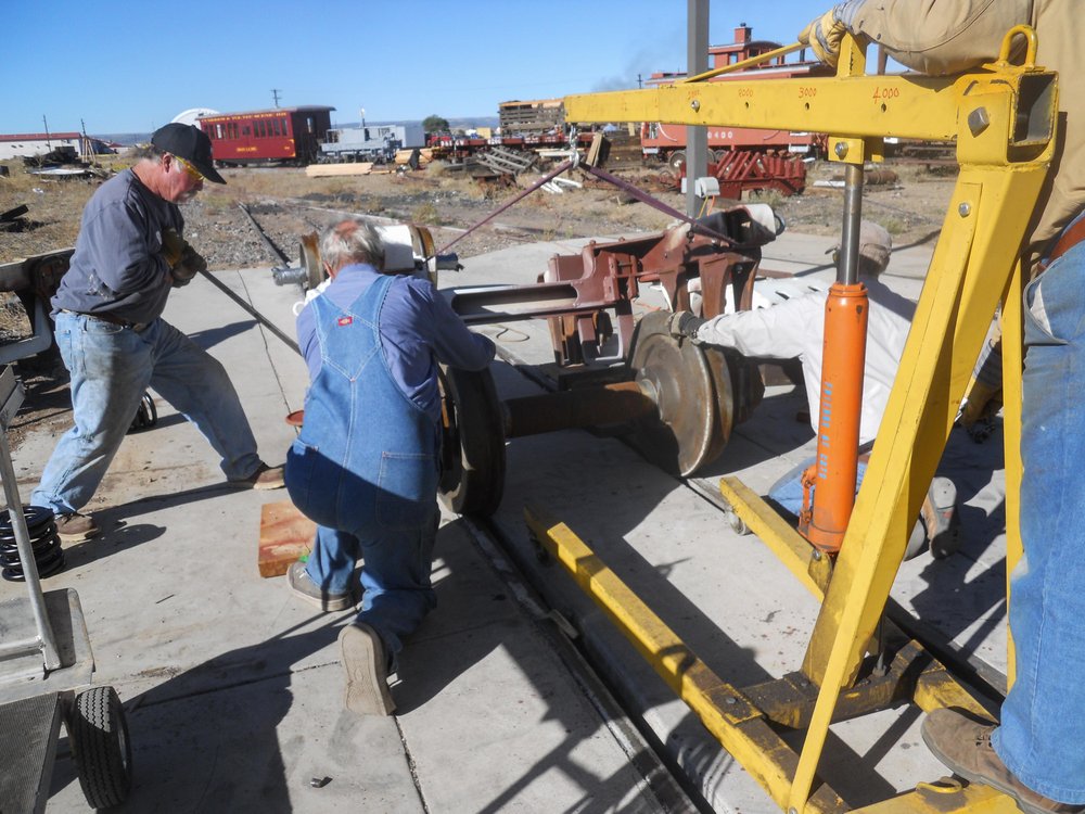 2018-09-27 Fitting a wheel set into the truck frame.jpg