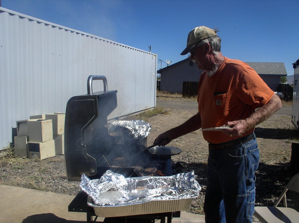 2018-09-27 Well, Doc McMullen is doing the cooking for hamburger day.jpg