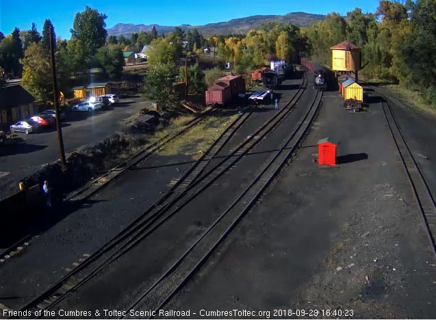 2018-09-29 The 484 comes by the tank as the last cars of the train are still outside the yard.jpg