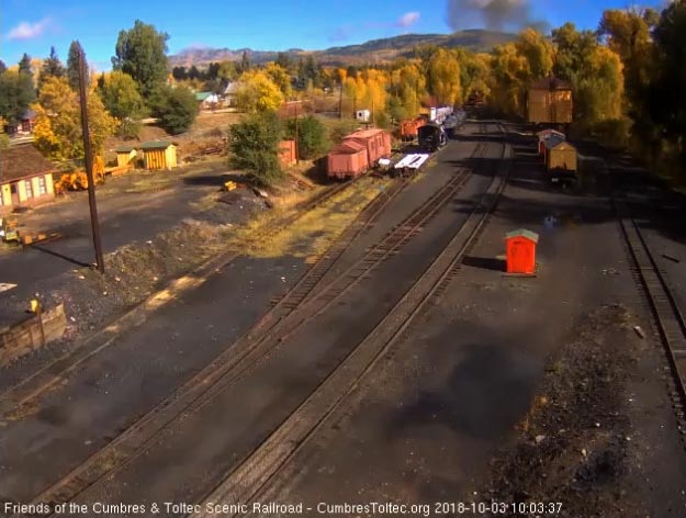 2018-10-03 The last cars are embraced by the fall colours of the trees at the north end of the yard.jpg