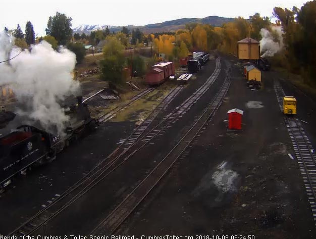 2018-10-09 The 488 is getting water at the tank as the loader is ready to dump a bucket of coal into the 463 tender.jpg