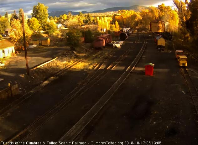 2018-10-17 Against the gold of the turning trees, the 487 is at the tank to take on water.jpg