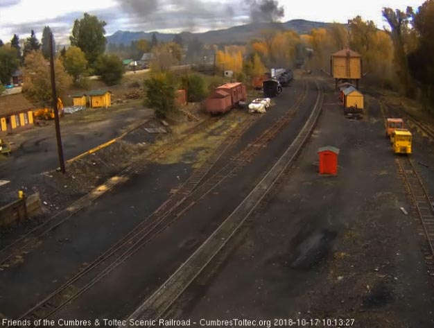 2018-10-17 The last cars are entering the curve as the smoke trails off.jpg