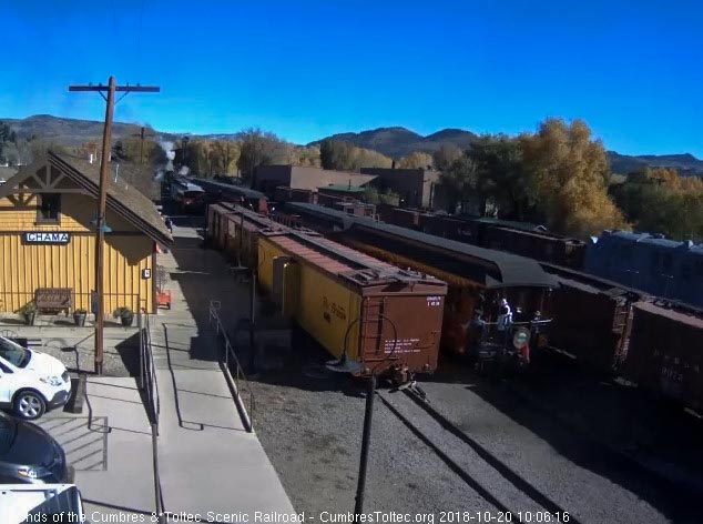 2018-10-20 After giving the high ball further up the train, the conductor has come back to board the parlor.jpg