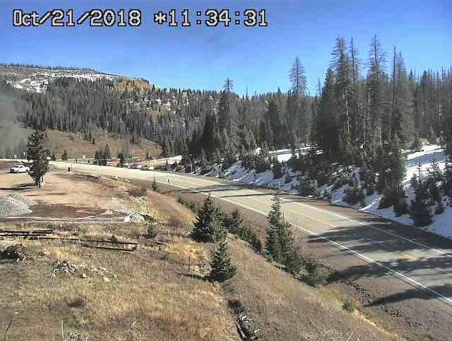 2018-10-21 The 216 is at the pass, look above the white truck and there is a haze of smoke.jpg