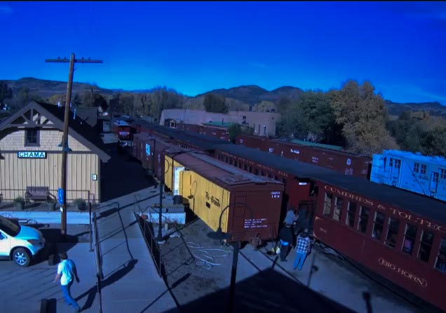 2018-10-21 The train is stopped and the conductor is placing the step box so passengers can get off.jpg