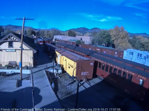 2018-10-21 This done the train is shoved back and the 2 extra coaches are detached and pulled the other side of the house access road.jpg