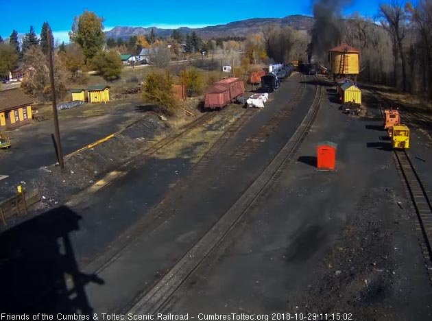 2018-10-29 The 487 is exiting the yard with its train as the speeder waits to follow.jpg