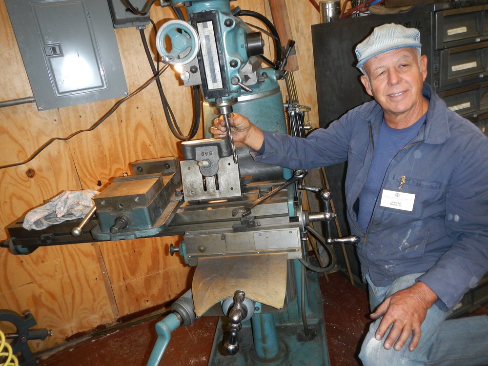 Grant Ball making final adjustment on a set up to dress end caps for wood brake beam - Tourist sleeper 470.jpg