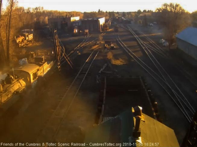 2018-11-08 The late evening sun shines yellow on the sides of 488 as the hostlers clean its fire.jpg