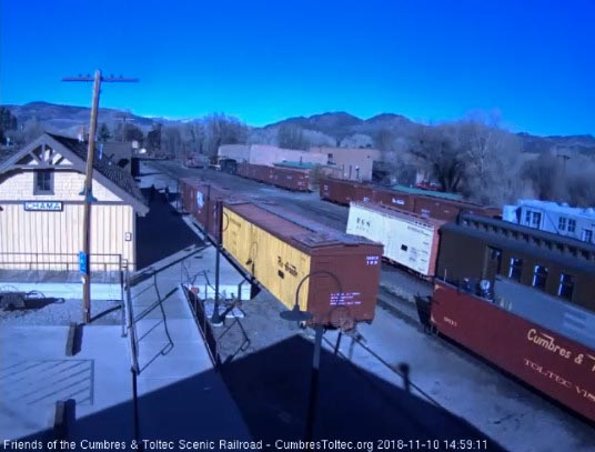 2018-11-10 As the open gon passes, we see the trainman in it waiting to do his work at the wye.jpg