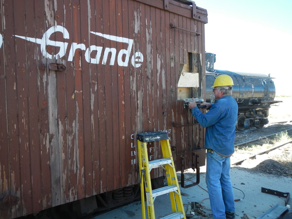 Thursday 6 - Potty-Concession car had some rot in a corner post - Russ hanscom is scarfing in a repair.jpg