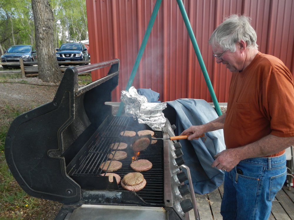 Wednesday evening - most Chama and Antonito volunteers traveled to the Recreational Hall at Mogote Meadows for Burger evening and lots of good companionship.  Russ Hanscom is burger meister.jpg