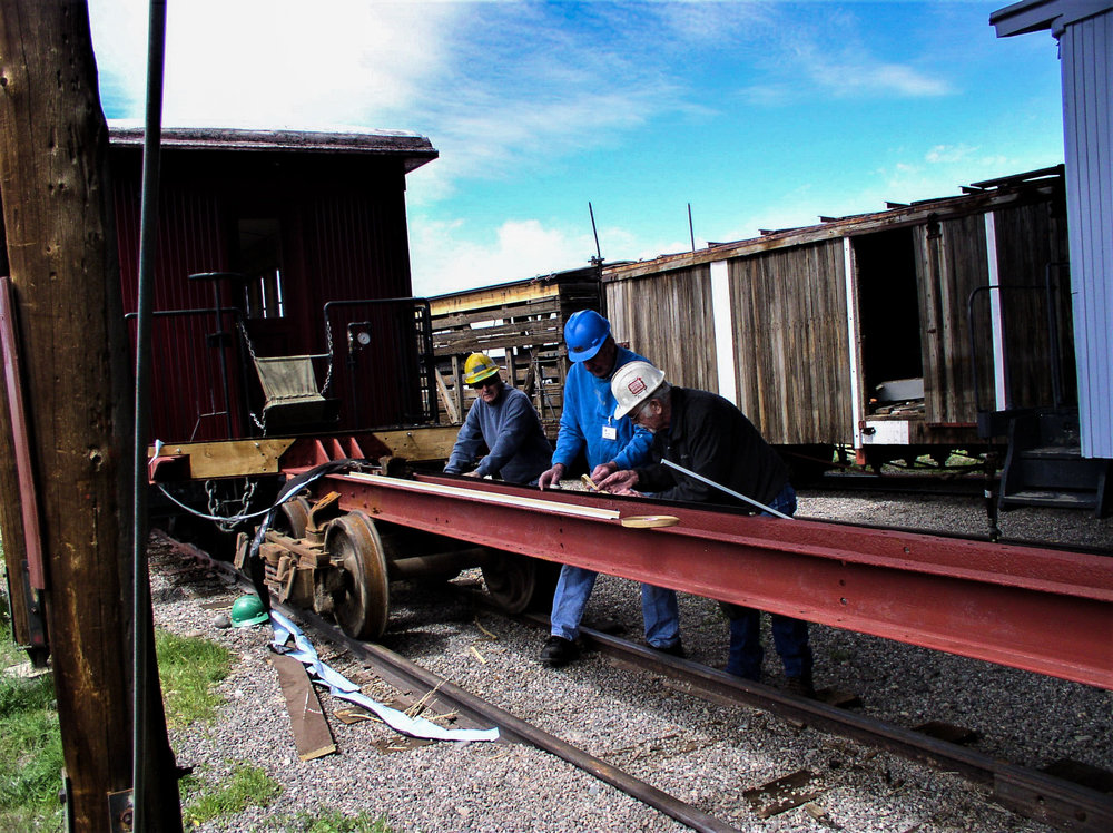 Work is progressing on steel flat car 6214.jpg