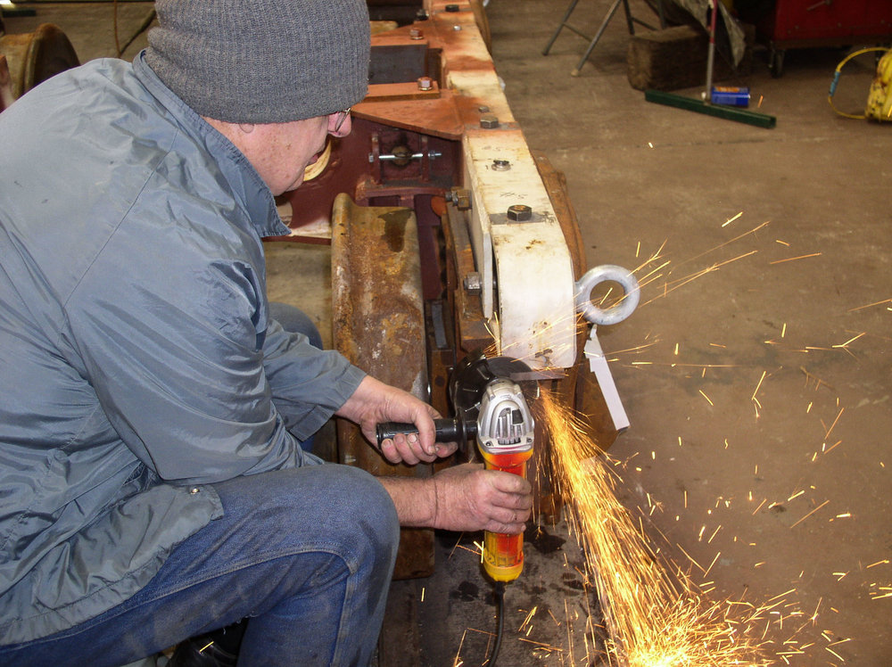 more frame grinding on one of the trucks.jpg