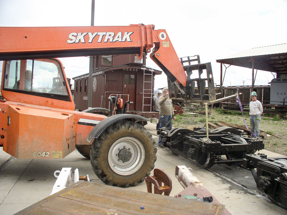 The crew is ready to lift a finished passenger car truck.jpg