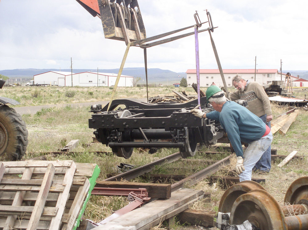 A finished passenger car truck is being moved.jpg