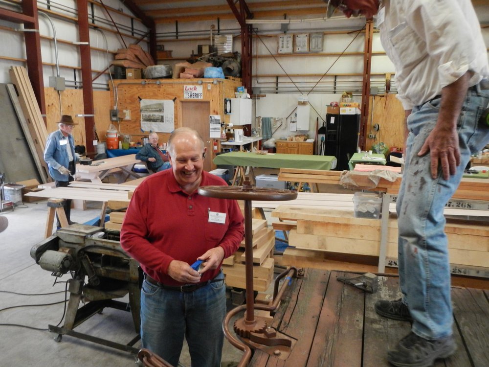 0 -  Project Co Chairman John Engs (high forehead) and Tim Bristrow are working replacing decking on flat car - soon to be a rider gon..jpg