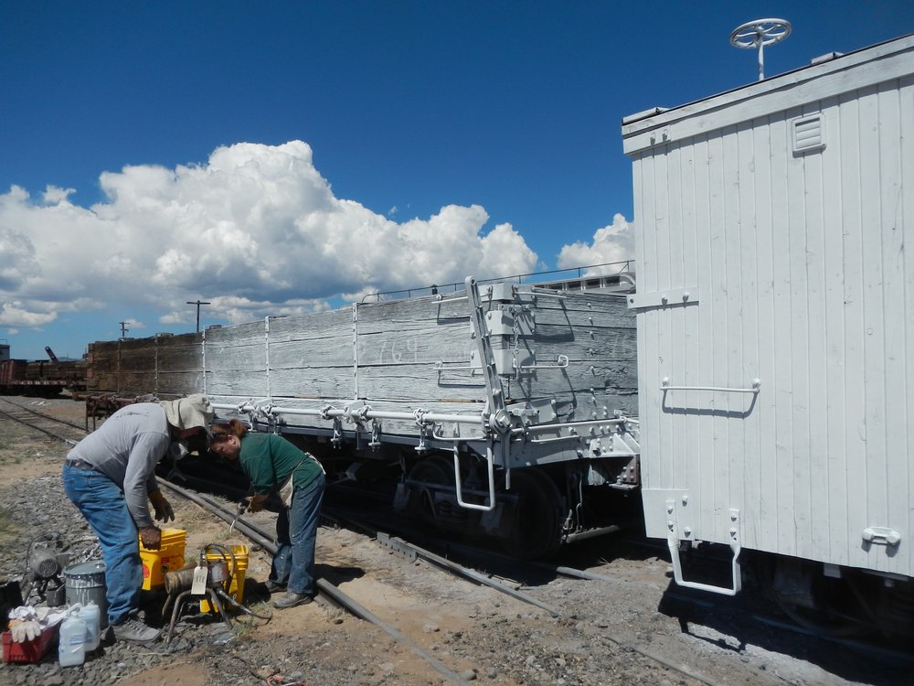 Beautiful painting weather - low winds!   789 gets its prime coat  while sitting next to Concession Potty 3244..jpg