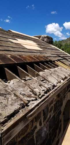 6.18.19 The roof showing what maybe crunbling stone (1 of 1).jpg