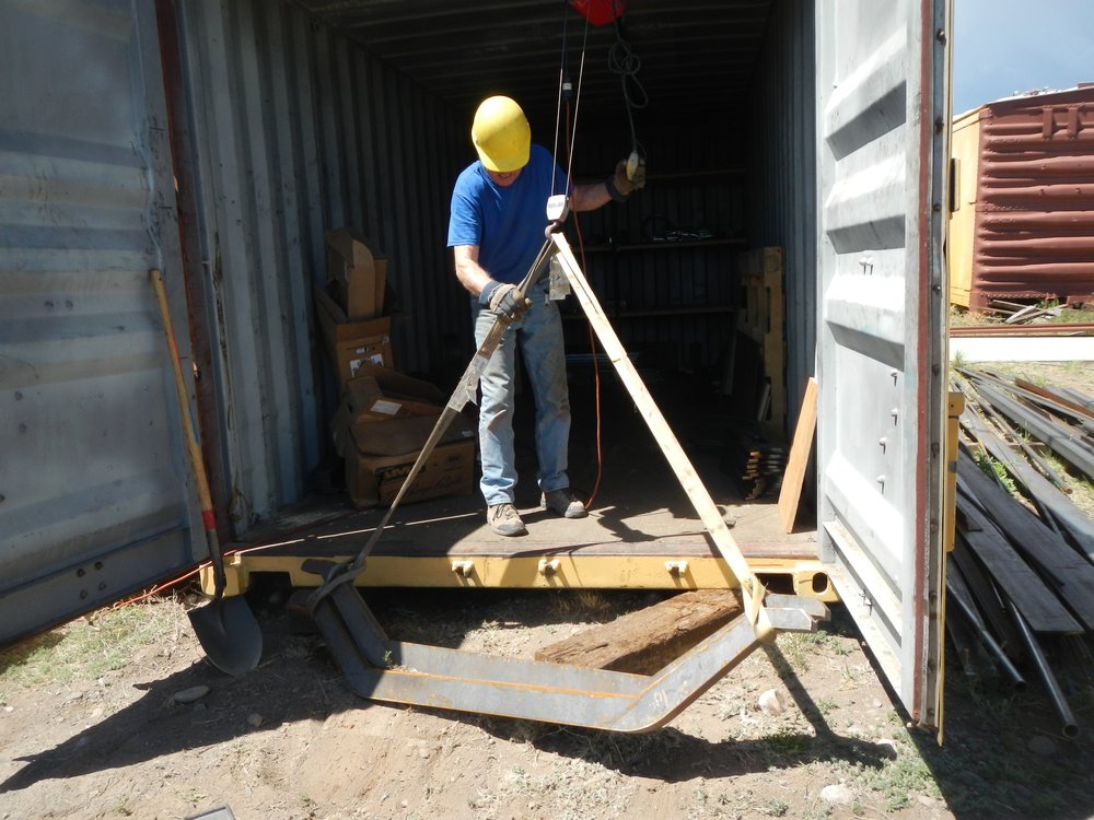 Russ Hanscom's electric hoist trolley installed in the container works like a charm - moving very heavy truck sub assemblies for storage..jpg