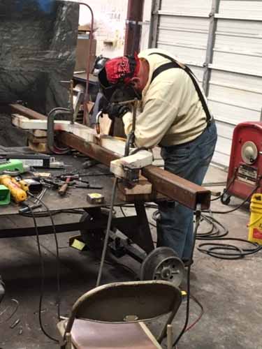 6.18.19 Antonito welding on a new piece for a car under  (1 of 1).jpg