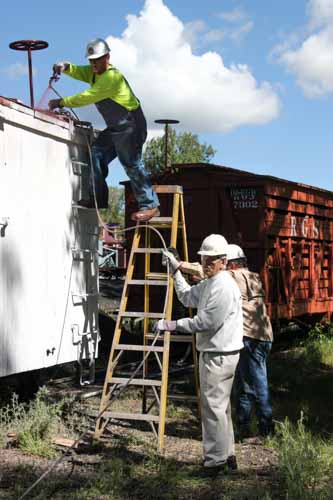 6.19.19 The roof almost done the painter backs off onto the ladder (1 of 1).jpg