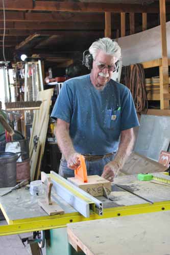 6.20.19 Doc McMullen is in the woodshop using good safety methods to cut the wood (1 of 1).jpg
