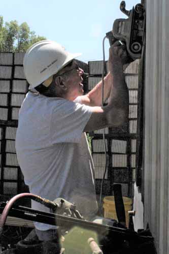 2019.06.21 Using the belt sander to get the new door ready to paint (1 of 1).jpg