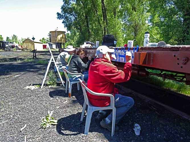 2019.06.21 The stenciling crew is hard at work (1 of 1).jpg