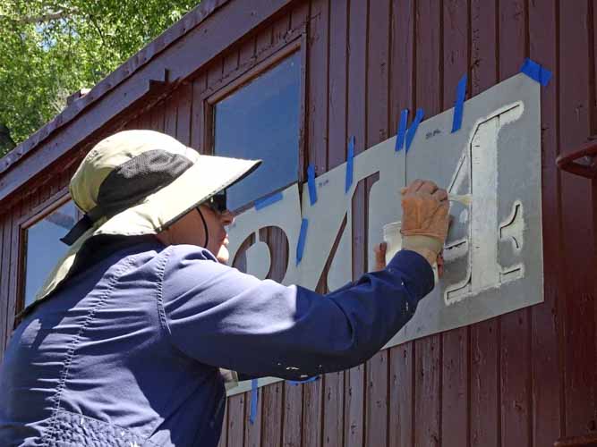 2019.06.21 Putting the car number on the freshly painted side (1 of 1).jpg