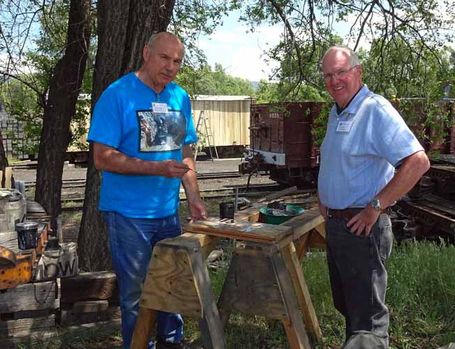 2019.06.26 Outside the woodshop under the shade tree some painting is happening (1 of 1).jpg