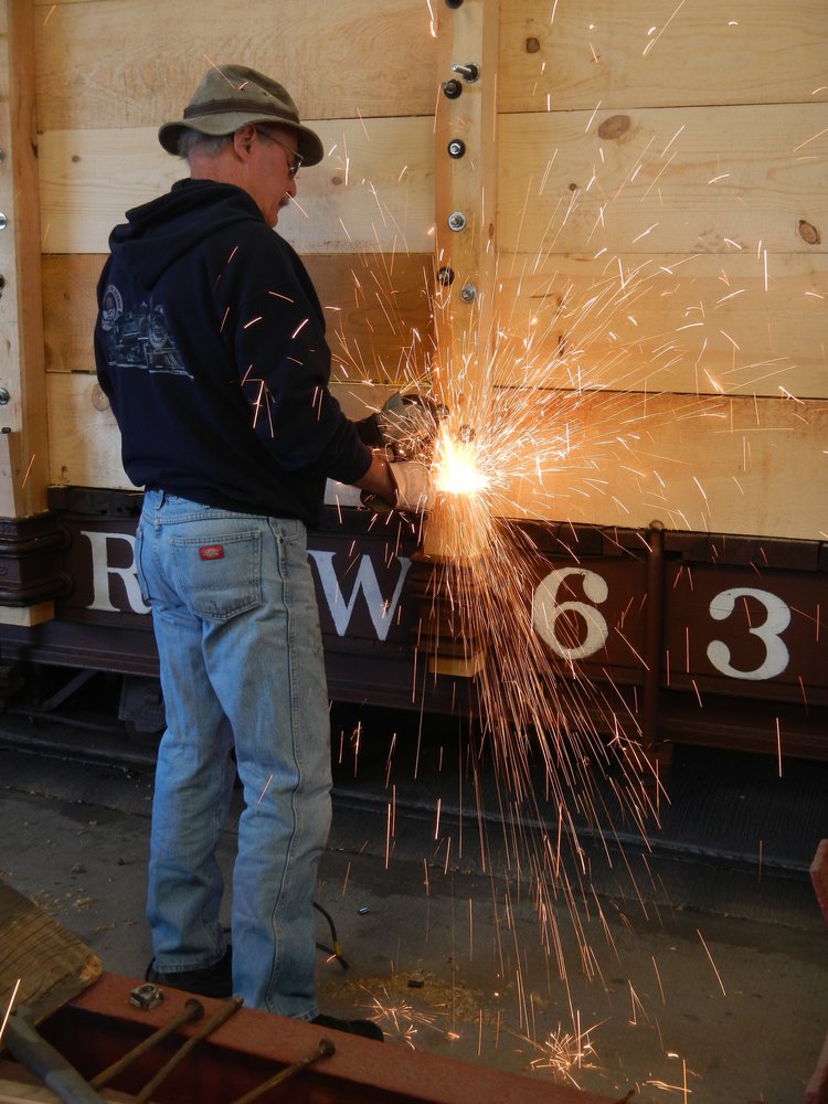 Team leader Tim bristow grinding too long bolts back to size on SG flat conversion to rider gon..jpg